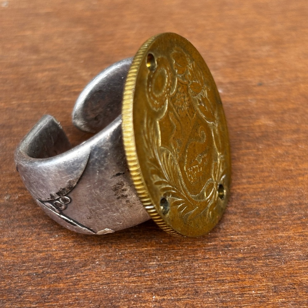 Vintage peruvian bras coin and silveplate spoon  rong